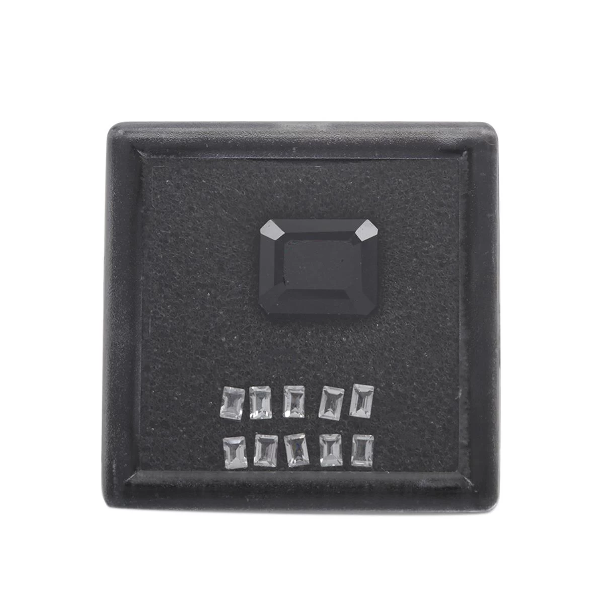 8cts Fissure - Filled Sapphire 1x (12x10 Octagon, Step Cut) 0.10cts White Topaz 10x (3x2mm Baguette, Step Cut) 3 8cts Fissure - Filled Sapphire 1x (12x10 Octagon, Step Cut) 0.10cts White Topaz 10x (3x2mm Baguette, Step Cut)