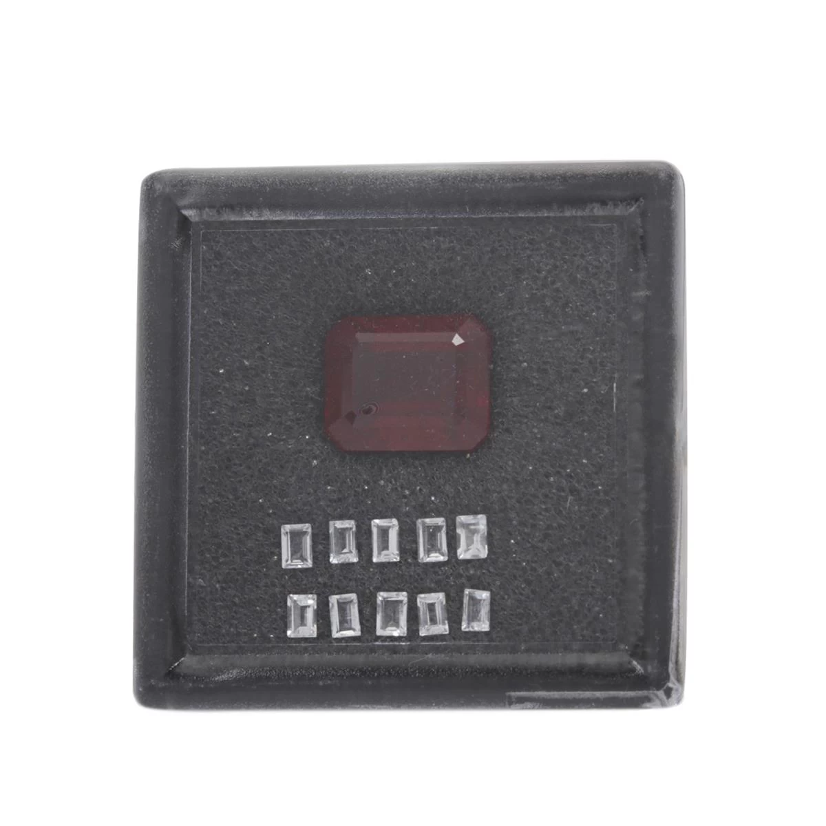 7cts Malagasy Ruby 1x ( 12x10 Octagon, Step Cut) 0.10ct White Topaz 10x (3x2 Mm Baguette, Step Cut) 3 7cts Malagasy Ruby 1x ( 12x10 Octagon, Step Cut) 0.10ct White Topaz 10x (3x2 Mm Baguette, Step Cut)